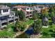 Picturesque backyard featuring a tranquil stream, gazebo, and lush green lawn at 9316 E Harvard Ave, Denver, CO 80231