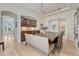 Stylish dining area with a sleek built-in bar and arched doorways, perfect for entertaining at 9316 E Harvard Ave, Denver, CO 80231