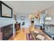 Inviting living room with a cozy fireplace, hardwood floors, and stylish decor at 2626 N Steele St, Denver, CO 80205