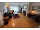 Cozy living area with fireplace, hardwood floors, and comfortable seating at 2626 N Steele St, Denver, CO 80205