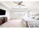 Large main bedroom provides ample natural light and comfortable seating at 14454 Grape Way, Brighton, CO 80602