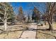 Inviting community park featuring benches, picnic table, swing set, and outdoor fire pit for residents to enjoy at 130 N Pearl St # 808, Denver, CO 80203