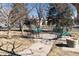 Inviting community park featuring benches, swing set, and a concrete fountain for residents to enjoy at 130 N Pearl St # 808, Denver, CO 80203