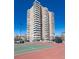 A stunning view of a high rise condo building featuring continuous balconies, near the community tennis courts at 130 N Pearl St # 808, Denver, CO 80203