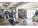 A community gym with plenty of machines, weight equipment, and mirrors for a complete workout experience at 130 N Pearl St # 808, Denver, CO 80203