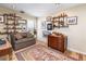 Inviting office space with a patterned rug and a comfortable brown sofa at 130 N Pearl St # 808, Denver, CO 80203