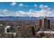 Expansive mountain view with residential neighborhood in foreground at 130 N Pearl St # 808, Denver, CO 80203