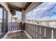 Outdoor balcony with wooden deck and railings at 16700 Las Ramblas Ln # O, Parker, CO 80134