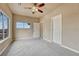 Well-lit bedroom featuring a window, closet, and ceiling fan at 16700 Las Ramblas Ln # O, Parker, CO 80134