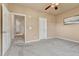 Bright bedroom with access to hallway and other rooms at 16700 Las Ramblas Ln # O, Parker, CO 80134