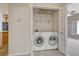 Laundry closet with washer and dryer included at 16700 Las Ramblas Ln # O, Parker, CO 80134