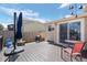Enjoy a cozy atmosphere on the outdoor deck, furnished with a grill and seating area for relaxation at 338 Chelsea St, Castle Rock, CO 80104