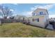 Large, grassy yard and deck are perfect for outdoor activities and relaxation at 338 Chelsea St, Castle Rock, CO 80104