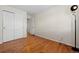 Bedroom features hardwood floors and sliding door closet at 338 Chelsea St, Castle Rock, CO 80104