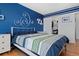 Comfortable bedroom featuring hardwood floors and a closet for ample storage space at 338 Chelsea St, Castle Rock, CO 80104