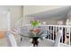 Bright breakfast nook featuring a glass top table with seating for four near the staircase at 338 Chelsea St, Castle Rock, CO 80104