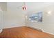 Bright dining room featuring hardwood floors and large windows for ample natural light at 338 Chelsea St, Castle Rock, CO 80104