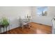 Office with hardwood floors features lots of natural light and wainscoting at 338 Chelsea St, Castle Rock, CO 80104