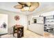 Kitchen area with a cozy breakfast nook, stainless steel appliances, and easy access to the living area at 11 S Perry St, Denver, CO 80219