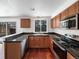 Modern kitchen features granite countertops and stainless steel appliances at 3850 Paseo Del Prado # 7, Boulder, CO 80301