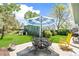 Charming backyard featuring a patio set and lush landscaping at 2252 Lamar St, Edgewater, CO 80214