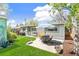 Inviting backyard with patio, seating area, and well-manicured lawn at 2252 Lamar St, Edgewater, CO 80214