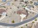 Aerial view of the property showcasing the lush landscaping, expansive lot, mature trees, and circular driveway at 7398 Weaver Cir, Castle Rock, CO 80104