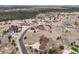 Aerial view of neighborhood featuring well-maintained homes, large lots, and beautiful landscaping at 7398 Weaver Cir, Castle Rock, CO 80104
