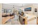 Open-concept entryway with wood and tile floors, leading to the living spaces at 7398 Weaver Cir, Castle Rock, CO 80104
