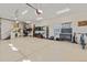 Large, organized garage with cabinets, tool storage, and plenty of room for vehicles and equipment at 7398 Weaver Cir, Castle Rock, CO 80104