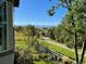 Neighborhood view showcasing the lush surroundings, walking path, and mountain views at 4285 Corte Bella Dr, Broomfield, CO 80023