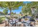 Cozy outdoor patio with Adirondack chairs and a fire pit, ideal for entertaining or relaxing at 4285 Corte Bella Dr, Broomfield, CO 80023