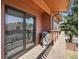 Balcony featuring sliding glass doors and a grill at 540 S Forest St # 3-204, Denver, CO 80246