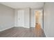 Comfortable bedroom with hardwood floors and ample closet space provides a peaceful retreat at 540 S Forest St # 3-204, Denver, CO 80246