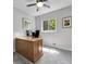 Bedroom with a large window providing natural light, complete with desk at 6810 S Marion W Cir, Centennial, CO 80122