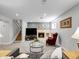 Cozy living room featuring a fireplace, entertainment center, and comfortable seating area at 6810 S Marion W Cir, Centennial, CO 80122