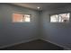 Bedroom with two windows and carpet flooring at 9191 Russell Way, Thornton, CO 80229
