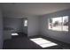 Bright living room featuring an open floorplan and neutral paint colors at 9191 Russell Way, Thornton, CO 80229