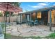Backyard patio featuring stone pavers and outdoor seating, perfect for enjoying outdoor living and entertaining at 4100 Shaw Blvd, Westminster, CO 80031