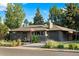 Beautiful single-story home showcasing manicured landscaping, brick exterior, an attached garage and inviting curb appeal at 4100 Shaw Blvd, Westminster, CO 80031