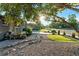 Charming home featuring a well-maintained front yard with drought resistant landscaping and a beautiful shade tree at 4100 Shaw Blvd, Westminster, CO 80031