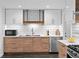 Well-lit kitchen featuring stainless steel appliances, modern cabinetry, and contemporary design at 4100 Shaw Blvd, Westminster, CO 80031