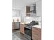 Modern kitchen with stainless steel oven and range, complementing the updated cabinetry at 4100 Shaw Blvd, Westminster, CO 80031
