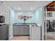 Basement kitchenette featuring modern appliances, ample counter space, and stylish decor at 4100 Shaw Blvd, Westminster, CO 80031