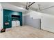 Spacious unfinished basement with laundry hookups, offering potential for customization at 402 Roosevelt St, Palmer Lake, CO 80133