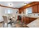 Bright kitchen featuring a butcher block countertop, stainless steel sink and dining table at 402 Roosevelt St, Palmer Lake, CO 80133