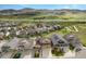 Panoramic aerial view shows the neighborhood's layout against a mountain backdrop at 6173 Eldora St, Golden, CO 80403