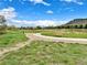 Scenic view of local park with walking path and mountain views at 6173 Eldora St, Golden, CO 80403