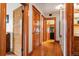 Classic hallway showcasing hardwood floors and wood trim at 1430 Monroe St, Denver, CO 80206