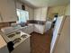 Traditional kitchen with classic appliances, ample counter space, and vintage charm at 1950 Glen Shiel Dr, Lakewood, CO 80215
